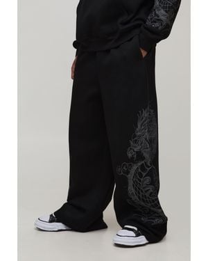 BoohooMAN Extreme Wide Leg Dragon Graphic Joggers - Black