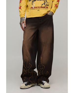 BoohooMAN Tall Flame Applique Baggy Fit Washed Tinted Jeans - Black