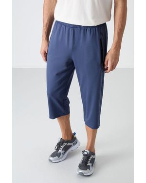 TOMMY LIFE Capri Cycling Shorts - Blue
