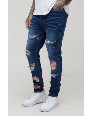 BoohooMAN Tall Floral Embroidered Ripped Stacked Skinny Jeans - Blue