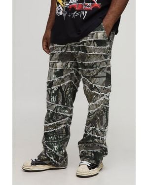 BoohooMAN Plus Camo Print Skinny Flare Raw Edge Applique Trousers - Black