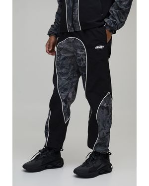 BoohooMAN Relaxed Fit Nylon Camo Colour Block Piping Trousers - Black
