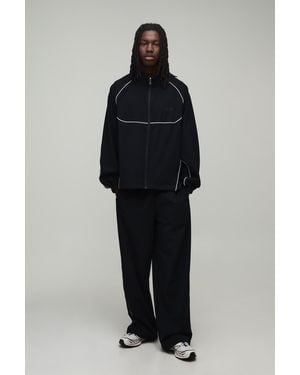 BoohooMAN Active Oversized Funnel Neck Zip Through Nylon Pipe Detail Tracksuit - Black
