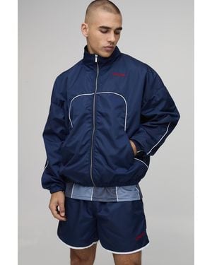 BoohooMAN Boxy Shell Seam Embroidered Funnel Dual Zip Short Tracksuit - Blue
