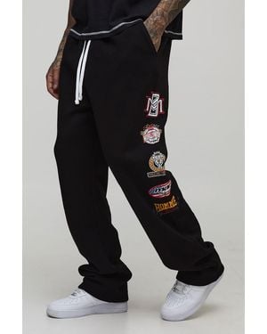 BoohooMAN Tall Extended Drawcord Baggy Fit Varsity Badge Print Joggers - Black