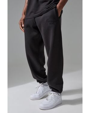 BoohooMAN Active Training Dept Oversized Embossed Joggers - Black