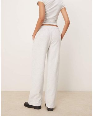ASOS Straight Leg Jogger With Marseille Embroidered Graphic - Natural