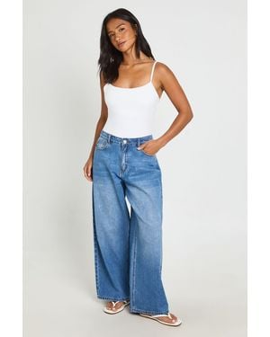 Boohoo Petite Mid Waist Loose Fit Wide Leg Jean - Blue