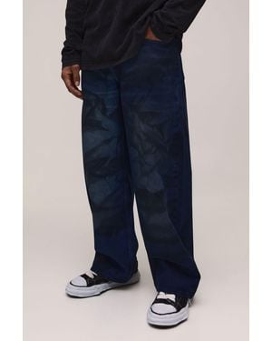 BoohooMAN Tie Dye Tinted Baggy Distressed Jeans - Blue