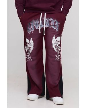 BoohooMAN Plus Relaxed Flare Spray Washed Skull Gusset Jogger - Purple