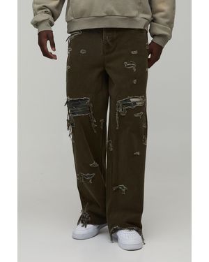BoohooMAN Overdye Camo Rip & Repair Baggy Fit Jeans - Green