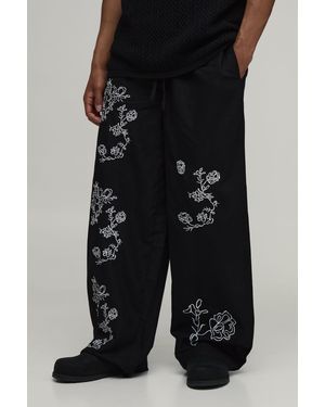 BoohooMAN Baggy Fit Linen Blend Small Floral Embroidery Trousers - Black