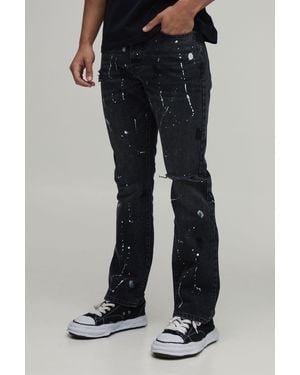 BoohooMAN Ripped Knee Paint Splatter Flared Jeans - Black