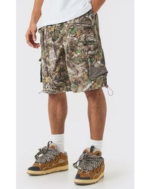 BoohooMAN Forest Camo Elasticated Waist Parachute Cargo Shorts - Green