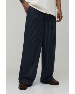 BoohooMAN Baggy Fit Pinstripe Pleat Front Tailored Trousers - Blue