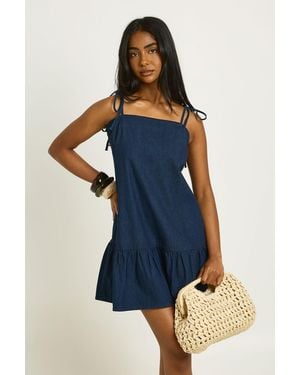 Boohoo Strappy Dropped Hem Denim Mini Dress - Blue