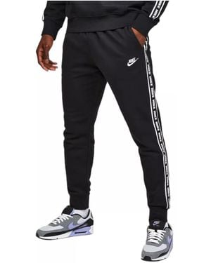 nike tape track pants grey