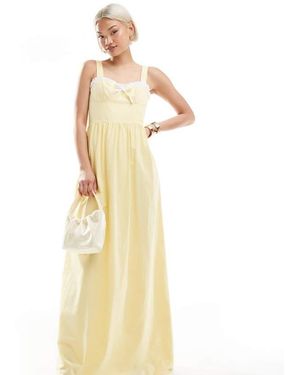 The Frolic Exclusive Sweetheart Contrast Ruffle Trim Bow Detail Maxi Dress - Metallic
