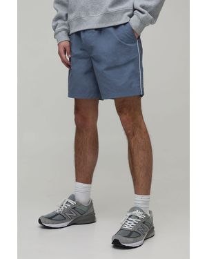 BoohooMAN Baggy Short Length Piping Nylon - Blue