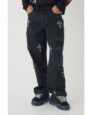 BoohooMAN Relaxed Fit Rhinestone Cross Ripped Washed Jeans - Blue