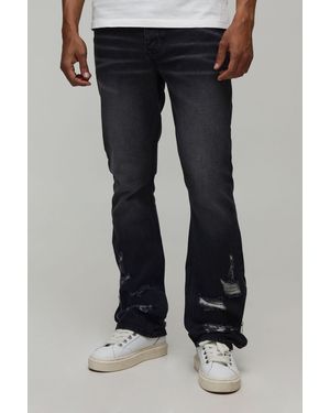 BoohooMAN Ripped Zip Hem Slim Stacked Flared Jeans - Black