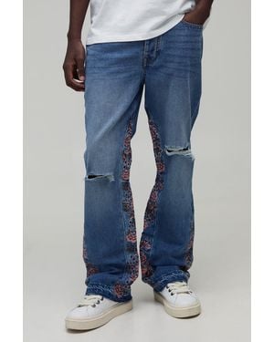 BoohooMAN Floral Gusset Ripped Knee Slim Flared Jeans - Blue