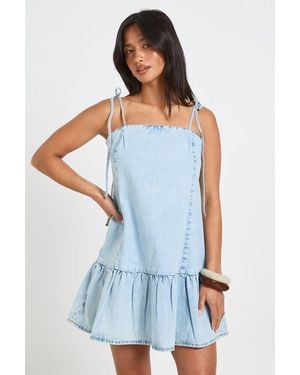 Boohoo Petite Strappy Dropped Hem Denim Mini Dress - Blue