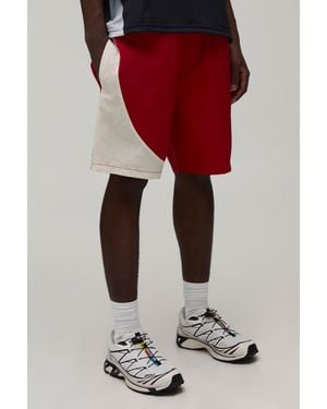 BoohooMAN Relaxed Fit Curved Panel Mid Length Nylon Shorts - Red