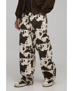BoohooMAN Tall Washed Baggy Fit Cow Print Jeans - Brown