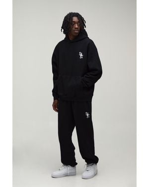 BoohooMAN Oversized Cross Graphic Hooded Tracksuit - Black