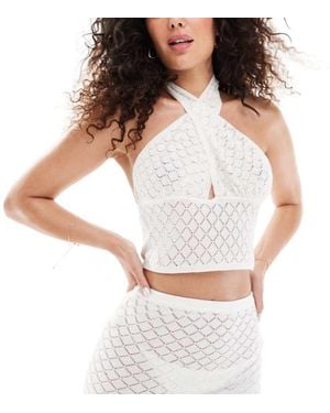 In The Style Exclusive Crochet Knit Halterneck Cut Out Beach Top Co-Ord - White