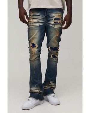 BoohooMAN Stacked Skinny Flared Ripped Jeans - Blue