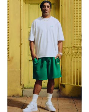 BoohooMAN Oversized Script Hi-Lo T-Shirt And Baggy Short Set - Yellow