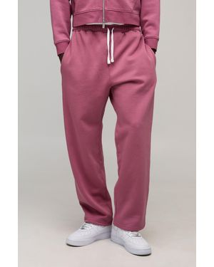 BoohooMAN Essential Washed Baggy Drop Crotch Jogger - Pink