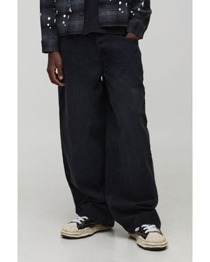 BoohooMAN Baggy Fit Washed Side Panel Jeans - Black