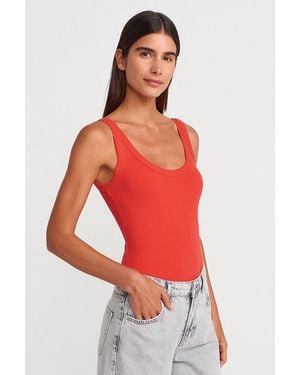 Dilvin Sleeveless Ribbed Cotton-Blend Bodysuit - Red