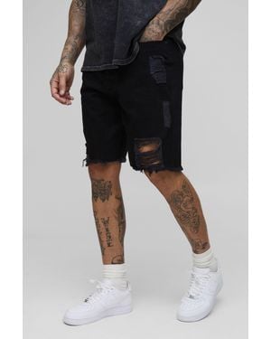 BoohooMAN Tall Relaxed Ripped Gusset Denim Shorts - Black