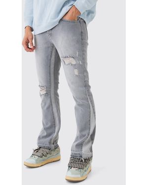 BoohooMAN Slim Flare Distressed Gusset Panel Jeans - Blue