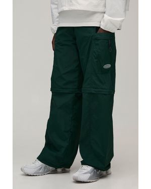 BoohooMAN Baggy Fit Zip Off Cargo Utility Track Trousers - Green