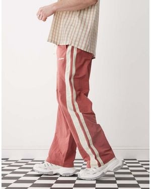 Prohibited Stripe Trackpants - Pink