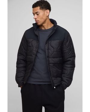 BoohooMAN Regular Fit Onion Quilted Panel Funnel Neck Jacket - Blue