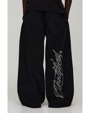 BoohooMAN Extreme Parachute Fit Certified Embroidered Trousers - Black