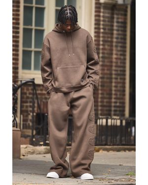 BoohooMAN Oversized Boxy Worldwide Debossed Wide Leg Tracksuit - Brown