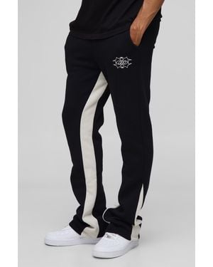 BoohooMAN Slim Stacked M Star Flare Gusset Joggers - Black