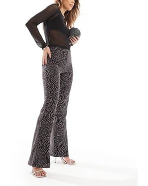 ONLY Zebra Print Glitter Flare Trouser - Black