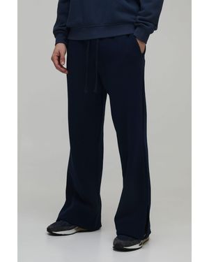 BoohooMAN Baggy Flared Fit Split Hem Joggers - Blue