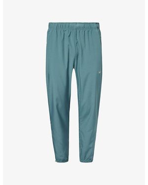 Nike Dri-Fit Tapered-Leg Lightweight Woven Jogging Bottoms - Blue