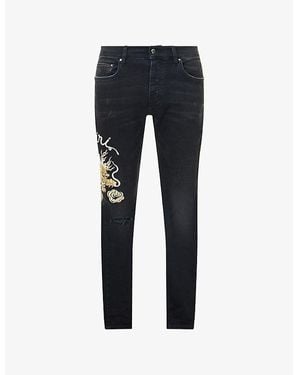 Amiri Dragon Repair Tapered-Leg Stretch-Denim Blend Jeans - Blue