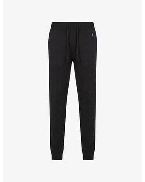 AllSaints Raven Logo-Embroidered Cuffed Cotton-Jersey Jogging Bottoms - Black