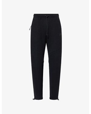 Nike Technical Logo-Print Stretch-Woven Jogging Bottoms - Black